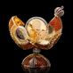 Mince s portrétem Gustava Fabergé se ukrývá v exkluzivním zlatém vejci